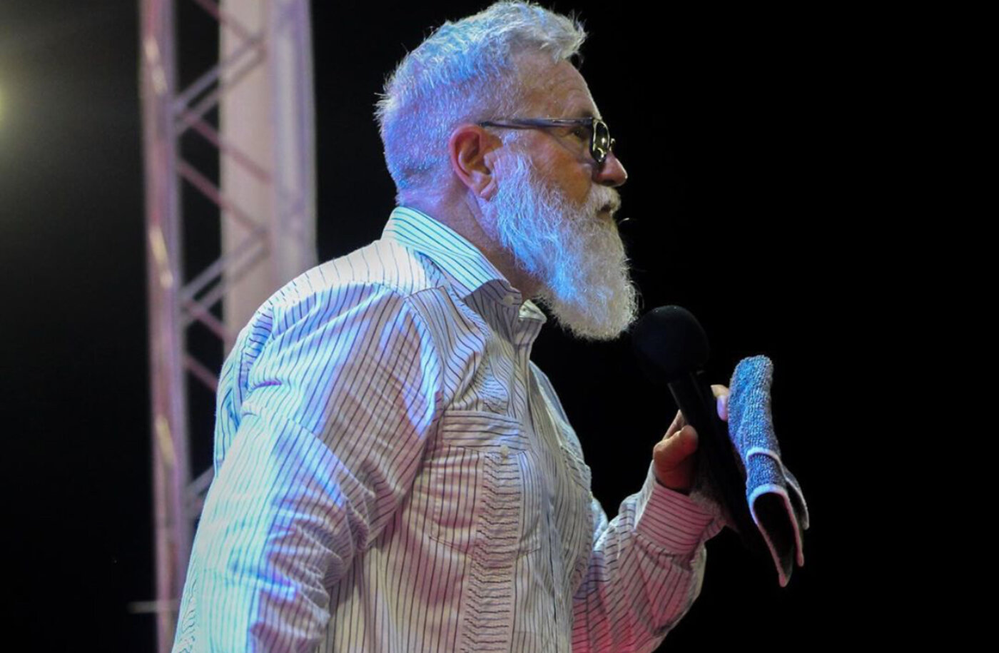 Marcus Triplett preaching at a service